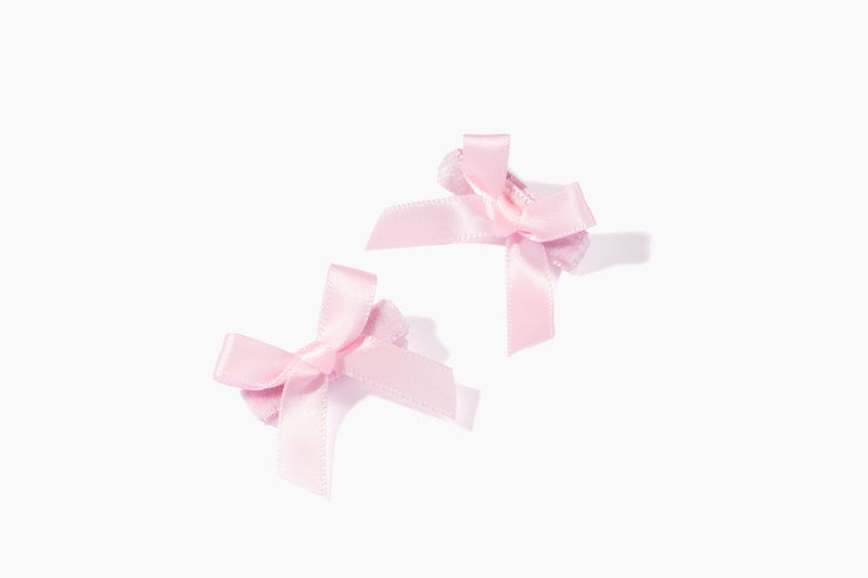 Pinces à crinière avec nœud rose